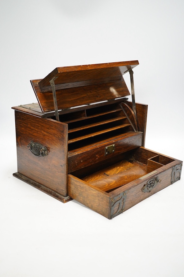 An early 20th century jewellery box and a similar oak stationery casket. Condition - poor